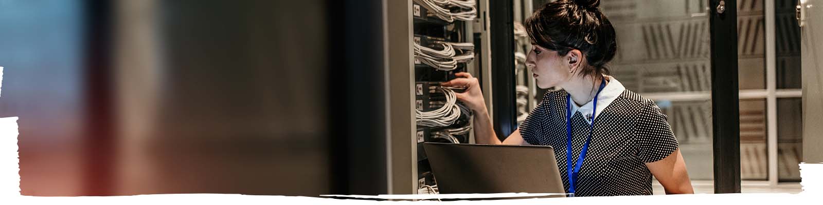 Women working on a server