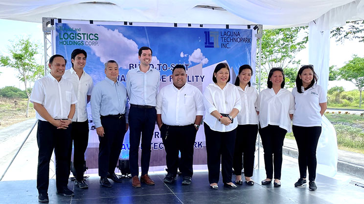 Group of people from JLL and AyalaLand Logistics in a groundbreaking ceremony