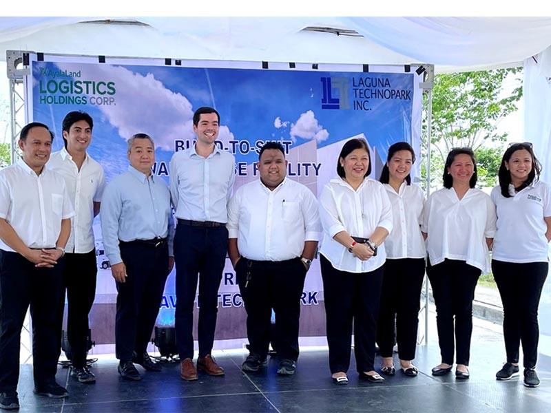 Group of people from JLL and AyalaLand Logistics in a groundbreaking ceremony