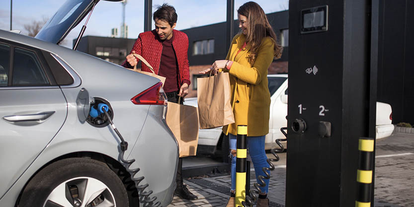 Fuel is filling for a car at fuel filling station