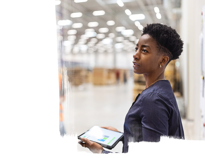 A woman holding a Ipad