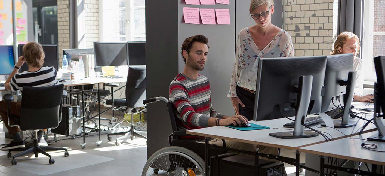 People working in the shared workspace